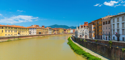 Fototapeta premium View of the medieval town of Pisa and river Arno