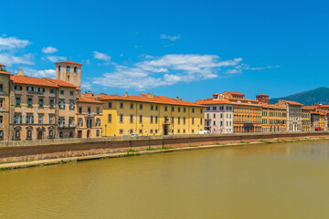 Fototapeta na wymiar View of the medieval town of Pisa and river Arno