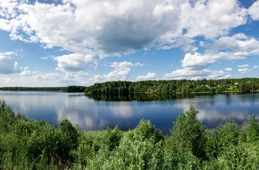 Foto op Canvas clouds over lake © Nikolay