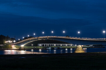 bridge over river at night