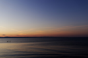 Sunset with sea and mountains