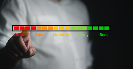 Man touch a worst level indicator rating on screen. Scale since low to high. Assessment concept....