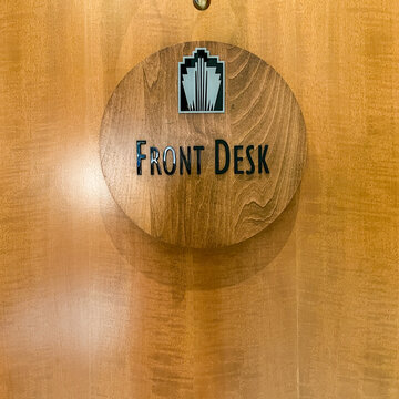 The Front Desk sign at a Condominium Building in the Buckhead district of Atlanta, GA.