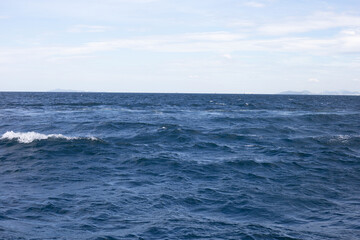 Fototapeta na wymiar Blue sea water surface texture. Blue ocean summer