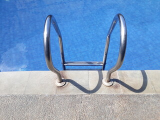 Aerial view aluminum swimming pool ladder © Adhi Syailendra
