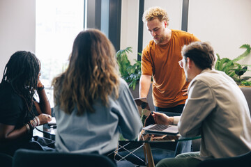 Multicultural group of professionals engaging in a business meeting