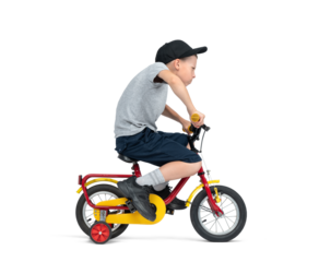 A teenage boy, in a cap, T-shirt, shorts, excitedly rides a children's bike, isolated on a transparent background png.