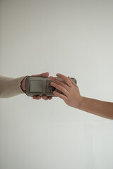 Hands holding triple socket and switch