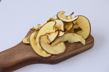 Heap of dried apple slices isolated
