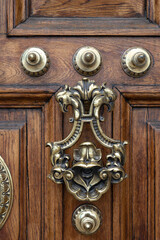 Detail of the beautiful handle of the old door of the General Captaincy of Barcelona