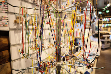 Colorful beaded necklaces. Handmade necklaces at souvenir stall or street market