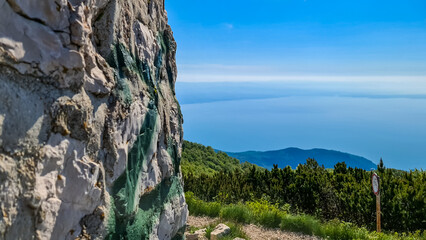 A panoramic view on the Mediterranean Sea in Croatia from Vojak. The mountain is overgrown with...