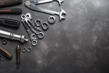Foto op Aluminium Auto mechanic's tools on grey stone table with copy space © ttonaorh