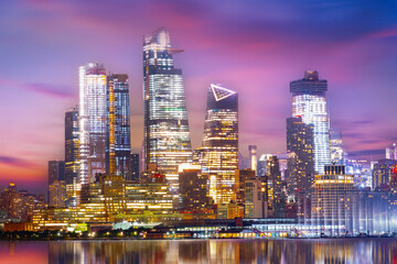 Fototapeta na wymiar New York City Manhattan downtown skyline at dusk with skyscrapers over Hudson River,