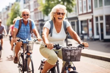 Gardinen Group of elderly tourists cycling in Amsterdam © Jasmina
