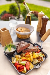 Grilled pork chops with roasted vegetables