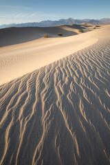 Scenic view on natural ripple sand pattern during sunrise at Mesquite Flat Sand Dunes, Death Valley...
