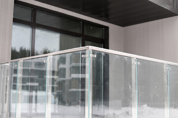 modern stylish glass decoration of the exterior of the balcony and terrace in the villa