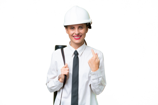 Young architect woman with helmet and holding blueprints over isolated background giving a thumbs up gesture
