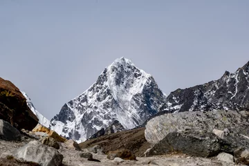 Papier Peint photo autocollant Makalu View of majestic snow covered himalayan range from everest base camp trek in nepal. Few of them are world's highest mountains. Glaciers and icy himalaya in the backdrop of a barren landscape trekking.