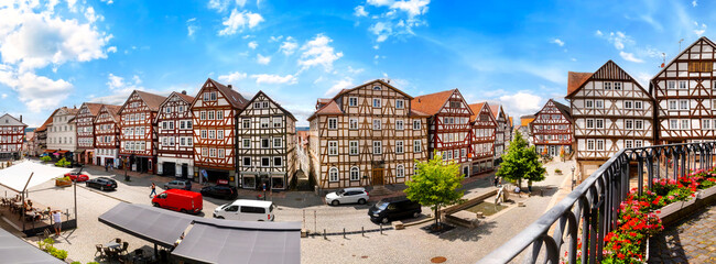 Fototapeta na wymiar Panorama of the Marktplatz (market square) with traditional half timbered houses in Homberg Efze, Hesse, Germany