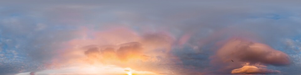Sunset sky panorama with bright glowing pink Cumulus clouds. HDR 360 seamless spherical panorama. Full zenith or sky dome for 3D visualization, sky replacement for aerial drone panoramas.