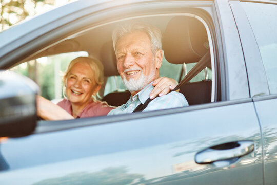 senior car couple woman man driving happy old retirement elderly retired lifestyle vehicle travel mature adult transport male female automobile auto drive transportation