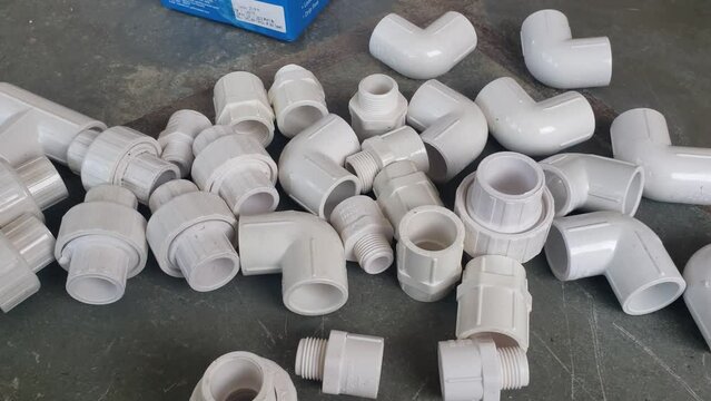UPVC CPVC Fittings for polypropylene pipes. Elements for pipelines. plastic piping elements. They are designed for connecting pipes. Concept sale of polypropylene fittings.