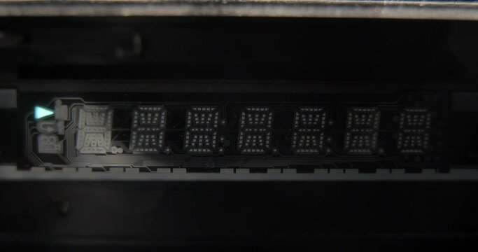 LCD display close-up, playing a disc from a DVD player