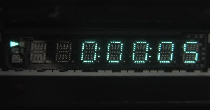 LCD display close-up, playing a disc from a DVD player