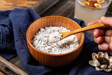 Nutritious breakfast made of dried lotus root powder and whole grains, indoor white background, nutritious porridge and healthy food