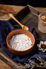 Nutritious breakfast made of dried lotus root powder and whole grains, indoor white background, nutritious porridge and healthy food