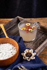 Nutritious breakfast made of dried lotus root powder and whole grains, indoor white background, nutritious porridge and healthy food