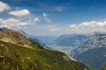 Obraz premium hazy view over Urnersee and Reusstal in summer