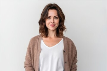 Medium shot portrait photography of a satisfied girl in her 30s wearing a chic cardigan against a white background. With generative AI technology