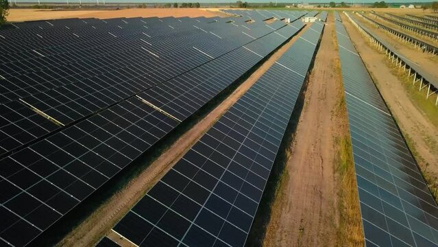 drone approach sola panel in big farm photovoltaic base station for green renewable energy supply production 