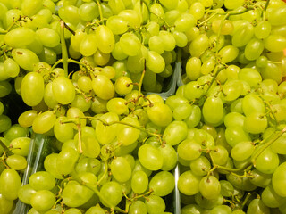 Bulk bunches of grapes exposed for sale in the market