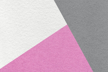 Fototapeta premium Texture of craft white, lilac and gray shade color paper background, macro. Vintage abstract pink cardboard