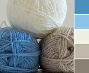Color palette swatches of yarn texture background in beige, brown and blue strains. Shallow depth...