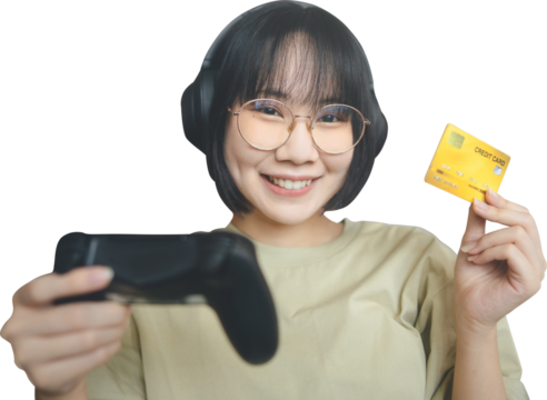 Asian gamer woman wear eyeglasses and headphone play a game using credit card cutout isolated white background