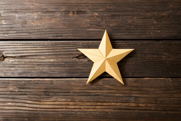 Fototapeta na wymiar Christmas star on wooden background