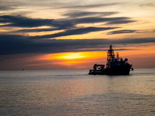 Fototapeta premium oil tanker in the sunset