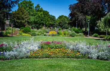 various colors of flowers and plants in a large park in germany in wassenberg