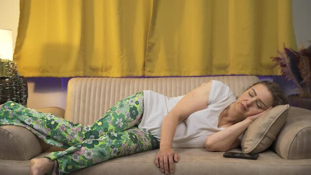 Woman snoring while sleeping.