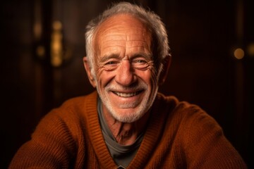 Lifestyle portrait photography of a happy old man wearing a cozy sweater against a copper brown background. With generative AI technology