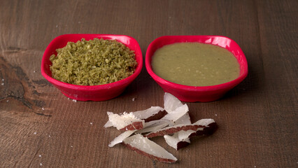 Coconut chutney in a bowl with raw coconut and green chilli ,Served with dosa, idli, vada