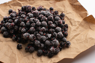 frozen blackcurrant on craft sheet