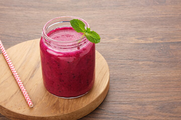 Delicious dragon fruit or pitahaya smoothie and fresh fruits with mint leaves
