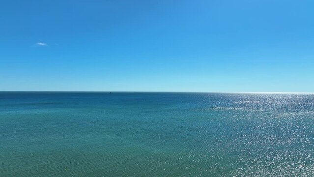 Aerial view of the Indian Ocean from Mahajanga, Madagascar, showcasing turquoise waters, coastal landscapes, and pristine beaches.