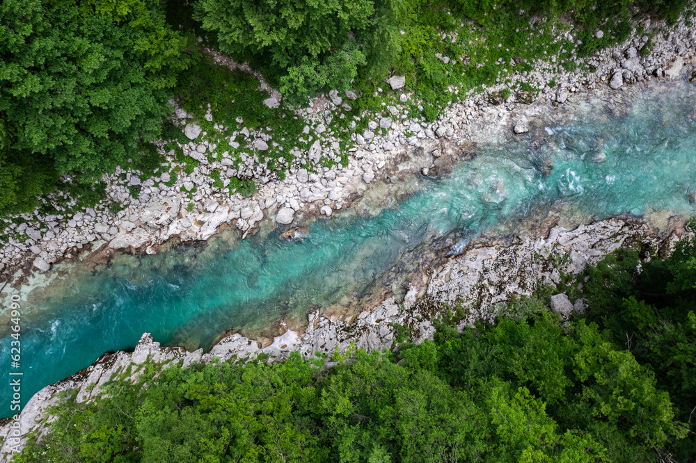 Wall mural soca river, slovenia. crystal clear and emerald green landscape. drone view - Wall murals